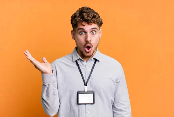 Young Adult Caucasian Man Looking Surprised Shocked Jaw Dropped Holding — Foto Stock