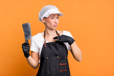 looking arrogant, successful, positive and proud. butcher concept