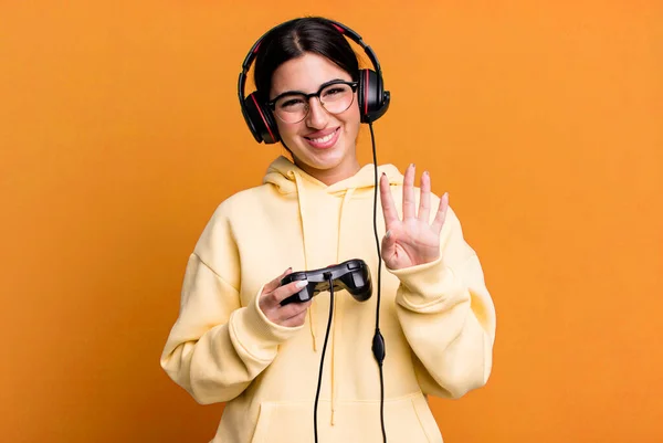 Smiling Looking Friendly Showing Number Four Gamer Concept — Foto Stock