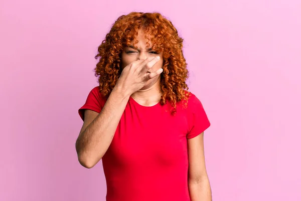Redhair Pretty Woman Feeling Disgusted Holding Nose Avoid Smelling Foul — Stock Photo, Image