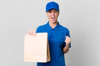 caucasian blonde woman shouting aggressively, looking very angry. paper bag delivery concept