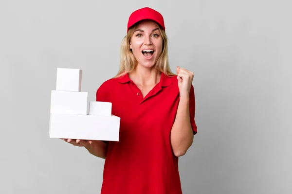 Caucasian Blonde Woman Feeling Shocked Laughing Celebrating Success Delivery Boxes — Zdjęcie stockowe