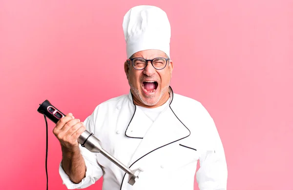 Uomo Anziano Mezza Età Urlando Aggressivamente Guardando Molto Arrabbiato Chef — Foto Stock