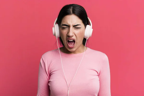 Shouting Aggressively Looking Very Angry Listening Music Headphones — Stockfoto