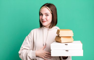 young pretty woman on green background