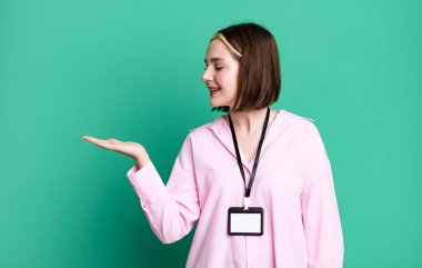 young pretty woman with an accreditation pass id