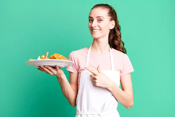 Young Pretty Woman Smiling Cheerfully Feeling Happy Pointing Side Waffles — Stock Photo, Image