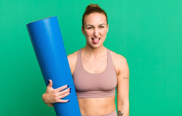 Young Pretty Woman Feeling Disgusted Irritated Tongue Out Fitness Yoga — Stockfoto