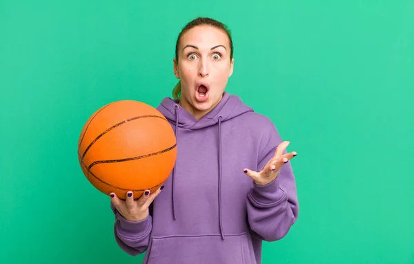 Young Pretty Woman Feeling Extremely Shocked Surprised Basketball Concept — Stock fotografie