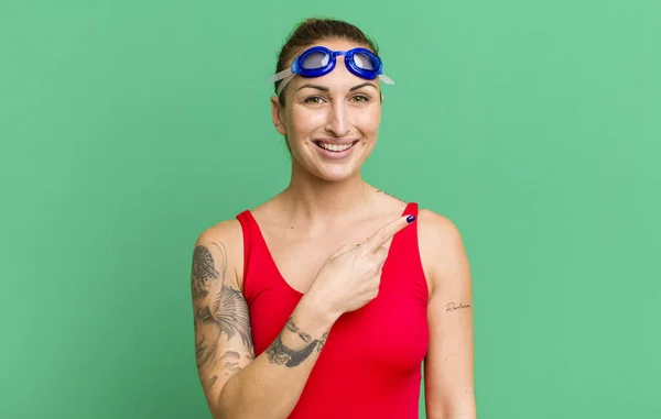 Young Pretty Woman Looking Excited Surprised Pointing Side Swimmer Concept — Stock Photo, Image