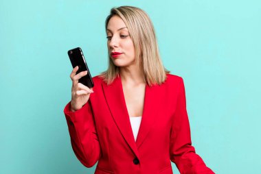 young pretty businesswoman using her smart phone