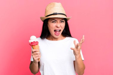 hispanic pretty woman looking angry, annoyed and frustrated. ice cream and summer concept