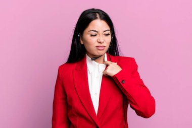 hispanic pretty woman feeling stressed, anxious, tired and frustrated. telemarketing concept