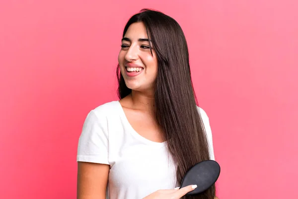 Pretty Hispanic Woman Using Hair Comb — Foto de Stock