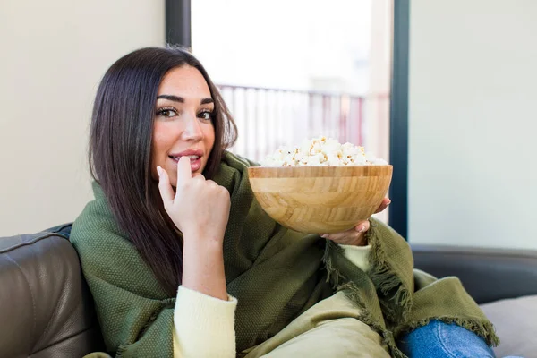Young Pretty Woman Eating Popcorns Sitting Couch Home — Stok fotoğraf