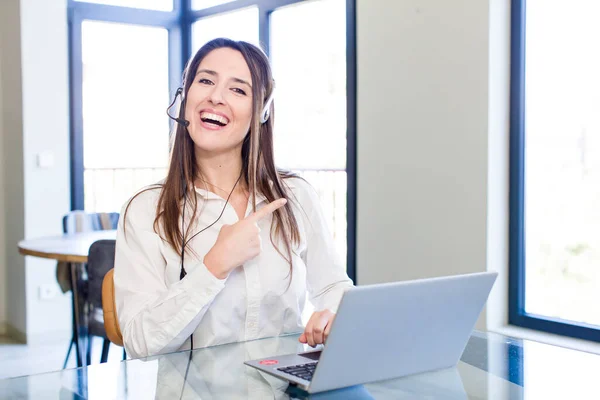Young Pretty Woman Smiling Cheerfully Feeling Happy Pointing Side Telemarketer — Stock Photo, Image