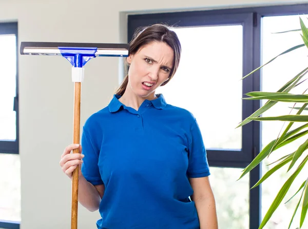 Young Pretty Woman Feeling Puzzled Confused Windows Washer Concept — Stockfoto