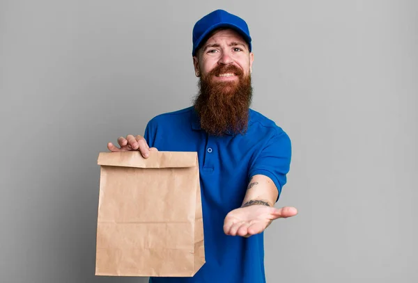 Young Adult Red Hair Bearded Cool Delivery Man Paper Bag — Stock Photo, Image