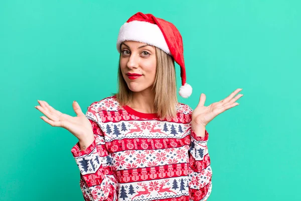 Pretty Blonde Woman Feeling Puzzled Confused Doubting Christmas Santa Hat — Stock fotografie