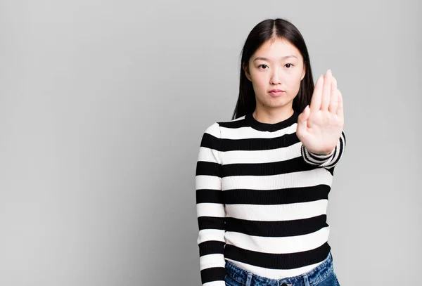Pretty Asian Woman Looking Serious Showing Open Palm Making Stop — Photo