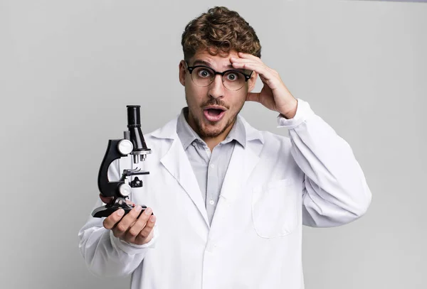 Young Adult Caucasian Man Looking Happy Astonished Surprised Scients Laboratory — Fotografia de Stock