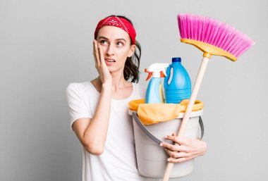 young pretty woman feeling bored, frustrated and sleepy after a tiresome. housekeeper concept