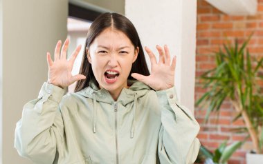 asian pretty woman at new home interior