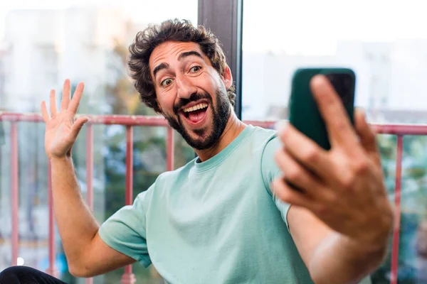 Young Adult Crazy Bearded Man Smartphone Interior View — kuvapankkivalokuva