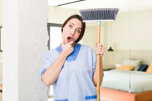 Young Pretty Woman Mouth Eyes Wide Open Hand Chin Housekeeper — Stok fotoğraf