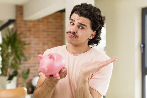 Young Handsome Man Piggy Bank Savings Concept Home Interior — Stock Photo, Image