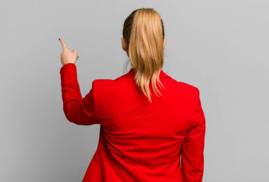 young pretty businesswoman wearing red blazer