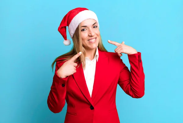 Pretty Blonde Woman Smiling Confidently Pointing Own Broad Smile Christmas — Stockfoto