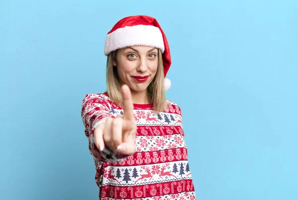 Pretty Blonde Woman Smiling Proudly Confidently Making Number One Christmas —  Fotos de Stock