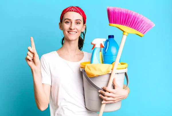Young Pretty Woman Smiling Looking Friendly Showing Number One Housekeeper — Stockfoto