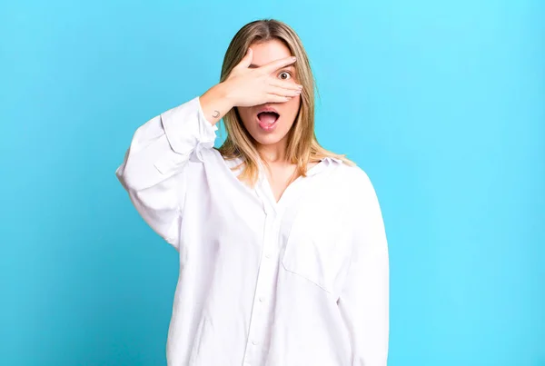 Blonde Pretty Woman Looking Shocked Scared Terrified Covering Face Hand — Stock Photo, Image