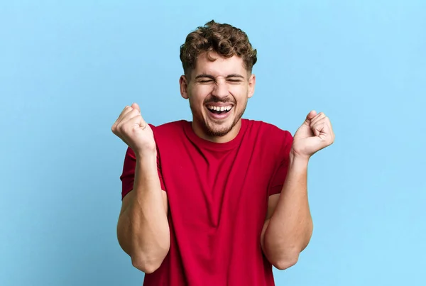 Young Adult Caucasian Man Looking Extremely Happy Surprised Celebrating Success —  Fotos de Stock