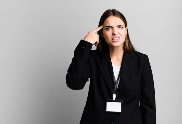 Young Pretty Woman Feeling Confused Puzzled Showing You Insane Businesswoman — Stockfoto