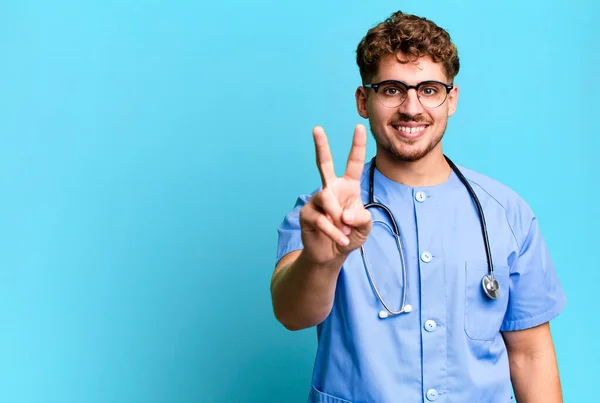 Young Adult Caucasian Man Smiling Looking Happy Gesturing Victory Peace — Photo