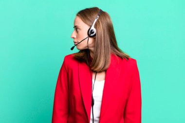 on profile view thinking, imagining or daydreaming. telemarketer concept