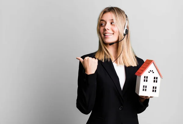 Young Pretty Woman Headset House Model Real State Concept — Stockfoto