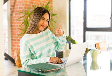 pretty latin woman teleconmmuting concept