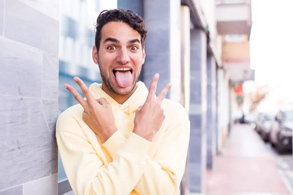 Young Hispanic Man Smiling Looking Happy Friendly Satisfied Gesturing Victory — Stock Photo, Image