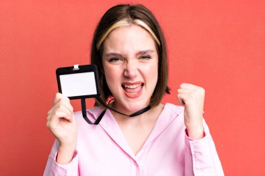 young pretty woman with an accreditation pass id