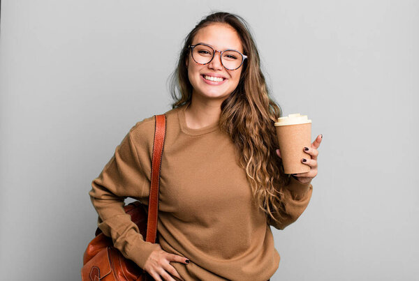 hispanic pretty woman smiling happily and daydreaming or doubting. take away coffee concept