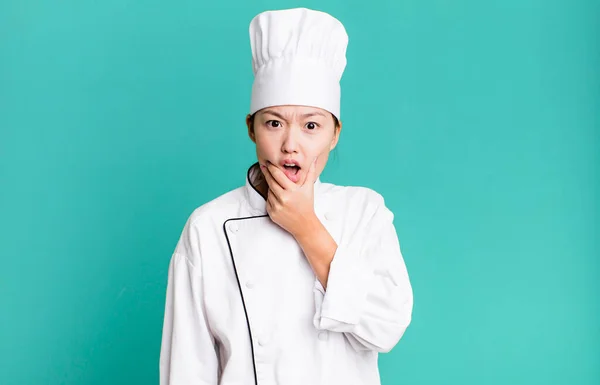 Pretty Asian Woman Mouth Eyes Wide Open Hand Chin Restaurant — Stock Photo, Image