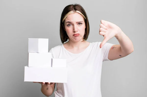 Young Pretty Woman Feeling Cross Showing Thumbs White Blank Boxes — Stock Photo, Image