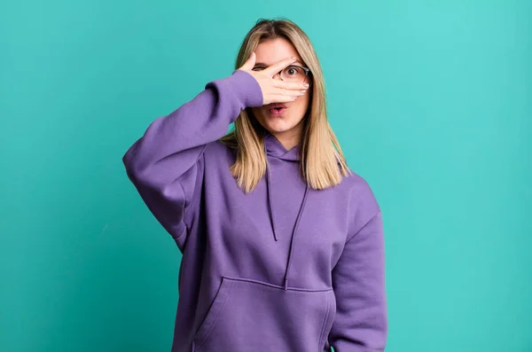 Blonde Pretty Woman Looking Shocked Scared Terrified Covering Face Hand — Stock Photo, Image