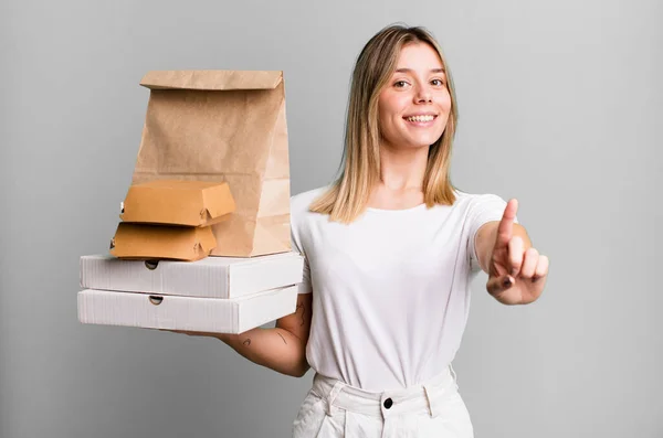 Young Pretty Woman Smiling Proudly Confidently Making Number One Delivery — Stock Photo, Image