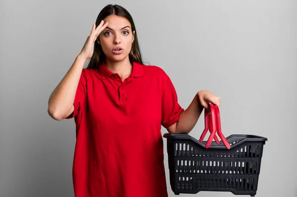 Young Pretty Woman Looking Happy Astonished Surprised Empty Shopping Basket — Stok fotoğraf