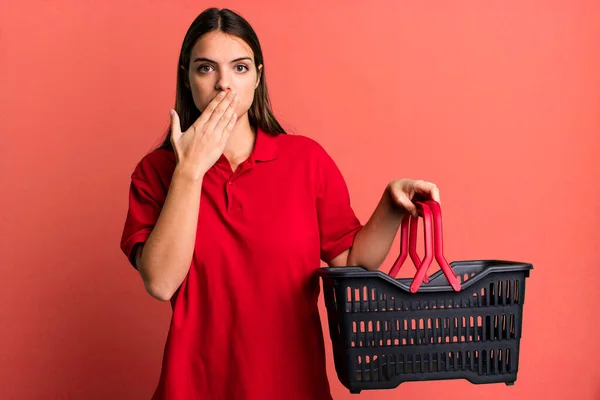 Young Pretty Woman Covering Mouth Hands Shocked Empty Shopping Basket — Foto Stock